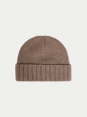 Brown knit beanie on a light gray background. #color_taupe