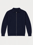 A navy blue knit zip-up sweater with a polo collar, displayed flat against a light gray background.