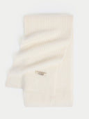 Beige ribbed knit scarf with a brand logo on a white background #color_white