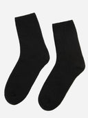 Pair of black socks on a white background. #color_black
