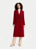 Woman wearing a red coat on a white background. #color_bordeaux #ai-image