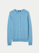 A blue crew neck cashmere cardigan with front button closures. #color_lichen-blue