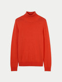 A turtle neck cashmere sweater in red color, displayed against a white background. #color_fiesta