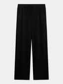 Black wide-leg trousers with an elastic drawstring waistband, displayed flat against a light gray background.