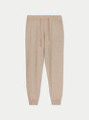 Beige jogger pants on a white background. #color_beige
