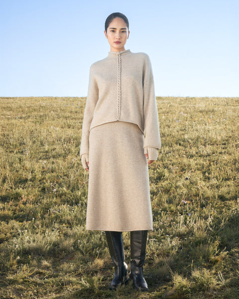 Cashmere Braided-Cable High-Neck Jumper in Taupe, editorial photo