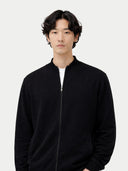 Man wearing a black jacket against a white background. #color_black #ai-image