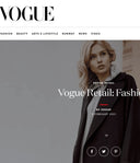Vogue Retail online article screenshot showing a model in a dark coat, part of GOBI Cashmere in Vogue coverage