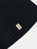 Black ribbed knit beanie with a gold 'Gobi' logo tag on a white background