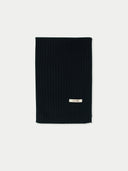 A black cashmere rib knit scarf with a subtle brand tag displaying the letter 'Gobi'.