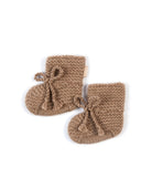 Pair of brown knitted baby booties with tassels on a white background | GOBI UK #color_taupe
