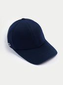 A navy blue baseball cap made of cashmere, displayed on a plain background. #color_indigo-blue