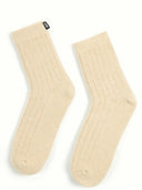 Pair of beige socks on a white background #color_beige