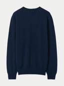 Navy blue sweater on a light gray background. #color_navy-blue