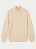 A beige half-zip knit sweater with a mock neck collar, displayed flat against a light gray background.