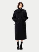 Person wearing a black coat on a white background #color_black