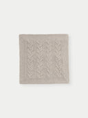 A knitted pillow cover in solid color with a cable knit pattern. #color_steel-silver