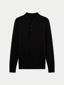 Black long-sleeve polo shirt on a light gray background