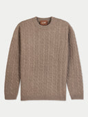 A taupe cable-knit crewneck sweater with a brown leather brand label reading 'GOBI' on the inside collar, displayed against a light gray background.