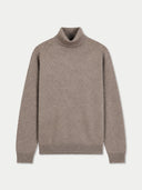 A taupe brown knit turtleneck sweater with long sleeves and ribbed cuffs, displayed on a clean off-white background.