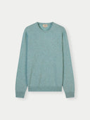 A crew neck cashmere sweater in a light blue color. #color_blue-haze