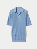 A blue cashmere silk polo shirt with an open collar and short sleeves. #color_celestial-blue