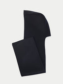 Black scarf folded on a light gray background