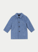 A blue cashmere sewn coat for kids with a collar, buttons, and a visible brand tag.