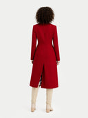 back view of a woman wearing a red coat with a white background. #color_bordeaux #ai-image