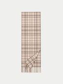 The taupe cashmere checked jacquard scarf laid flat with one corner folded back.