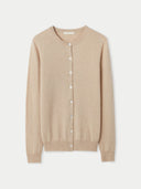 A beige crew neck cashmere cardigan with a round neckline and short sleeves. #color_beige