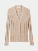 A beige button-up cashmere cardigan laid out flat on a plain surface.