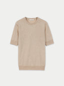 A beige, crew neck, short-sleeved cashmere top. #color_whisper-white