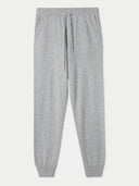 A pair of gray cuffed cashmere joggers for women. #color_light-gray