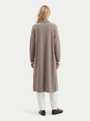 The Cashmere Shawl-Collar Long Cardigan in Taupe, shown worn.