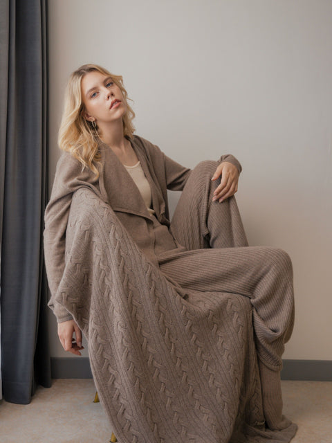 Cable Knit Cashmere Blanket in Steel Silver, editorial photo