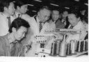 Black-and-white archive photograph, 1987: J. Batmunkh and officials watching a GOBI spinning machine