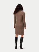 back view of a woman wearing a brown dress and black boots on a white background. #color_taupe #ai-image