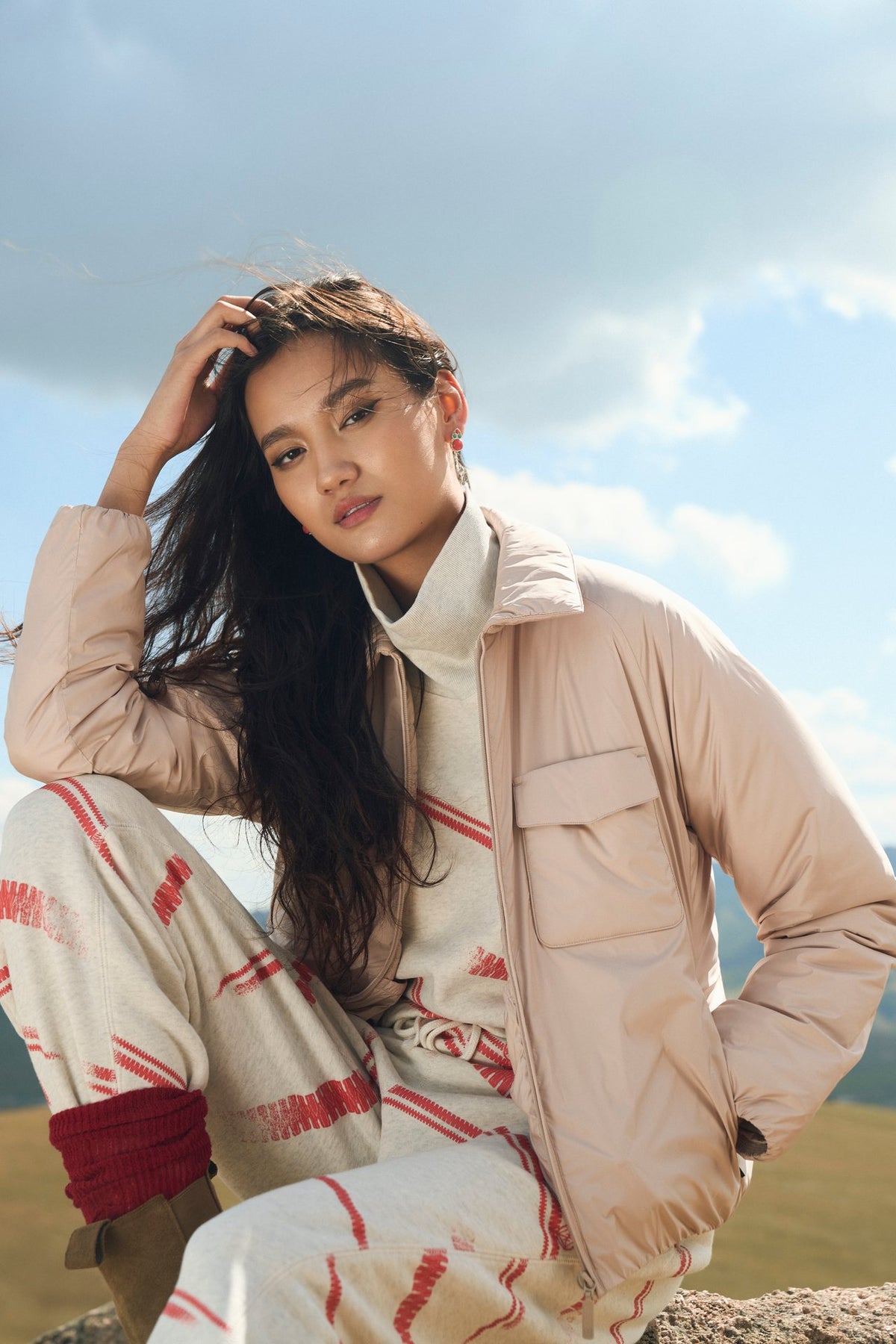 Woman outdoors in a pale pink CashmereTech jacket