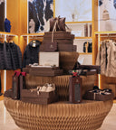 A display of GOBI gift boxes stacked on a honeycomb paper stand inside a store
