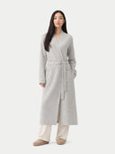 Woman wearing a gray robe on a white background. #color_steel-silver #ai-image